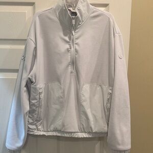 Vuori women’s Aspen Half Zip Pullover in Salt with Embroidered Detail